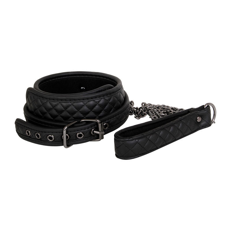 7-piece advanced bondage set in black diamond-stitched vegan leather by Adam & Eve with cuffs, collar, ball gag, leash, blindfold, paddle, and hogtie, focus on leash | Flirty bay online adult store, adult toys and lingerie